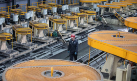 A man works in a workshop of a graphite company in Jixi City, northeast China's Heilongjiang Province, March 24, 2023. 