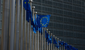 European flags in front of the European Commission headquarters in Brussels.