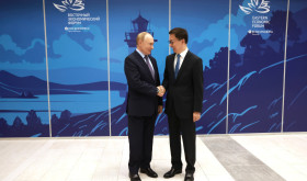 Russian President Vladimir Putin greets Chinese Vice President Han Zheng at the Eastern Economic Forum in Vladivostok, Russia on September 4, 2024