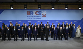 Turkish President Recep Tayyip Erdogan greets the leaders as they take part in the family photo taken at the 16th BRICS Summit in Kazan, Russia on October 24, 2024.