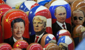 Traditional Russian wooden dolls called Matryoshka depicting China's President Xi Jinping, U.S. President-elect Donald Trump and Russian President Vladimir Putin are displayed for sale at a souvenir shop in St. Petersburg, Russia.