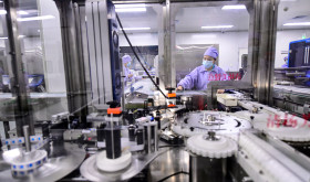 Busy production line of Northeast Pharmaceutical Group Co., Ltd. in Shenyang, Liaoning Province, China.