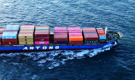 A cargo ship loaded with foreign trade containers sails out of the port of Qingdao in Shandong province, China on March 18, 2025.