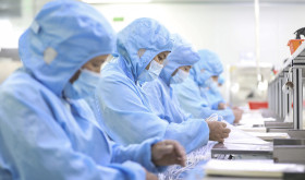 Workers make medical infusion sets for export at a workshop in Huai 'an City, Jiangsu Province, China