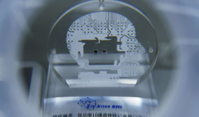 high-performance neural signal recording and stimulation chip is pictured at the exhibition hall of "Xitou Qizhnao Smart Energy Science Innovation Center" in Hangzhou, Zhejiang province