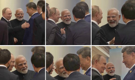 ussian President Vladimir Putin, left, Indian Prime Minister Narendra Modi, centre, and Chinese President Xi Jinping talk ahead of the Shanghai Cooperation Organization (SCO) summit