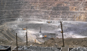 In this photo taken Tuesday, July 6, 2010, workers use machinery to dig at a rare earth mine in Baiyunebo mining district 