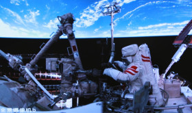 Beijing Aerospace Control Center shows Shenzhou-20 astronaut Chen Zhongrui performing extravehicular activities outside China's orbiting space station on June 26, 2025.