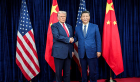 U.S. President Donald Trump, left, greets Chinese President Xi Jinping, right, before a bilateral meeting at Gimhae Air Base, October 30, 2025, in Busan, South Korea. 
