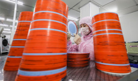 Workers stepped up the production of chips for orders at home and abroad