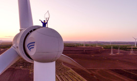 Aerial photo workers inspect equipment at a wind power photovoltaic field in Ulanhot, Hinggan League, Inner Mongolia, China, May 23, 2023