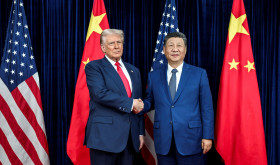 U.S. President Donald Trump, left, greets Chinese President Xi Jinping, right, before a bilateral meeting at Gimhae Air Base, October 30, 2025, in Busan, South Korea.