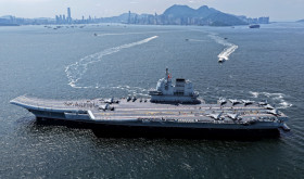 Visitors on-board the aircraft carrier Shandong on July 4, 2025.