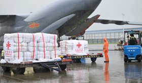 Staff members load flood relief supplies provided by the Chinese government to Pakistan at Zhengzhou Xinzheng International Airport in Zhengzhou, central China's Henan Province, Sept. 27, 2025. 