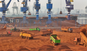 Trucks dump bauxite imported from Guinea into a pile at a ore dock in Yantai in eastern China's Shandong province, Wednesday, March 25, 2026. Bauxite smelters produce rare-earth elements (REEs) as a byâproduct, Credit:TANG KE / Avalon