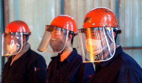 Chinese workers survey the production of steel at a plant of Qingdao Special Iron and Steel Co., Ltd. in Qingdao city.