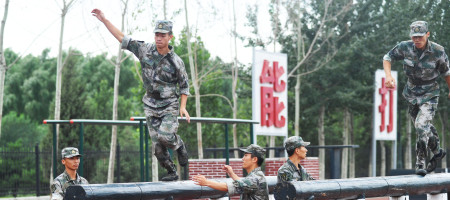 Chinese soldiers take part in a training session at the Academy of Armored Forces Engineering of the Peoples Liberation Army (PLA) in Beijing, China, 22 July 2014.