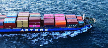  A cargo ship loaded with foreign trade containers sails out of the port of Qingdao in Shandong province, China on March 18, 2025.
