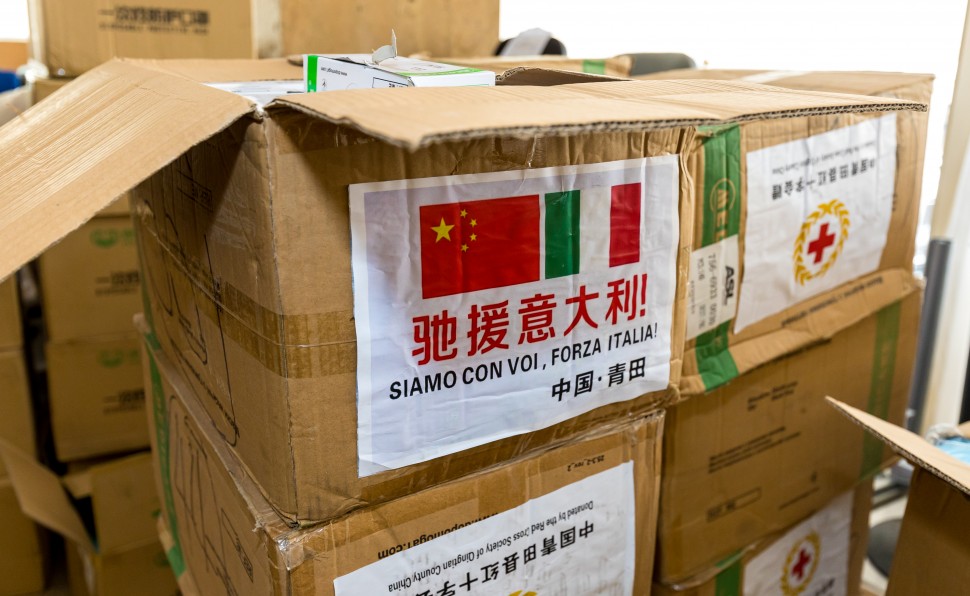 Boxes marked with Chinese and Italian flags containing face masks destined for Italy