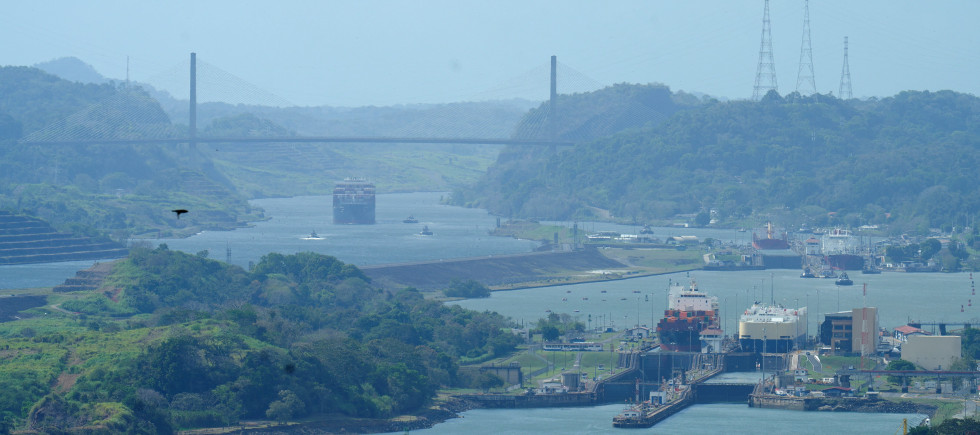 A ship sails through the Panama Canal after Hong Kong's CK Hutchison agreed to sell its interests in a key Panama Canal port operator to a BlackRock Inc-backed consortium.