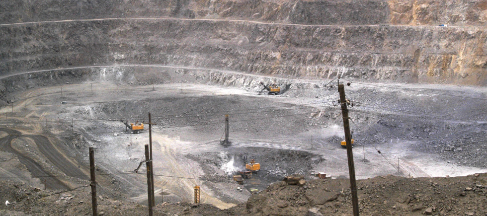 In this photo taken Tuesday, July 6, 2010, workers use machinery to dig at a rare earth mine in Baiyunebo mining district