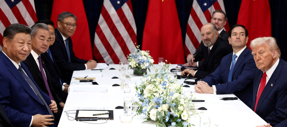 U.S. President Donald Trump, accompanied by U.S. Secretary of State Marco Rubio and U.S. Secretary of Commerce Howard Lutnick, attends a bilateral meeting with Chinese President Xi Jinping, accompanied by Chinese Foreign Minister Wang Yi, at Gimhae International Airport, on the sidelines of the Asia-Pacific Economic Cooperation (APEC) summit, in Busan, South Korea, October 30, 2025. 
