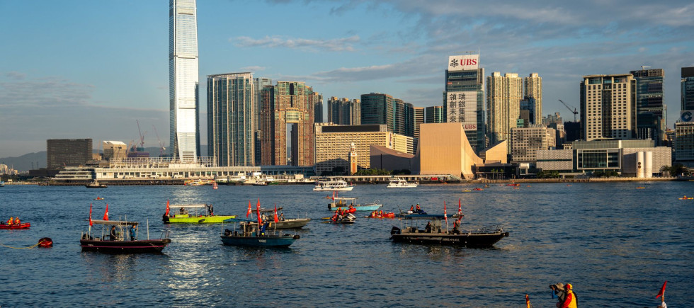 Swimmers participate in the Victoria Harbour Race in Victoria Harbor on November 22, 2025 in Hong Kong