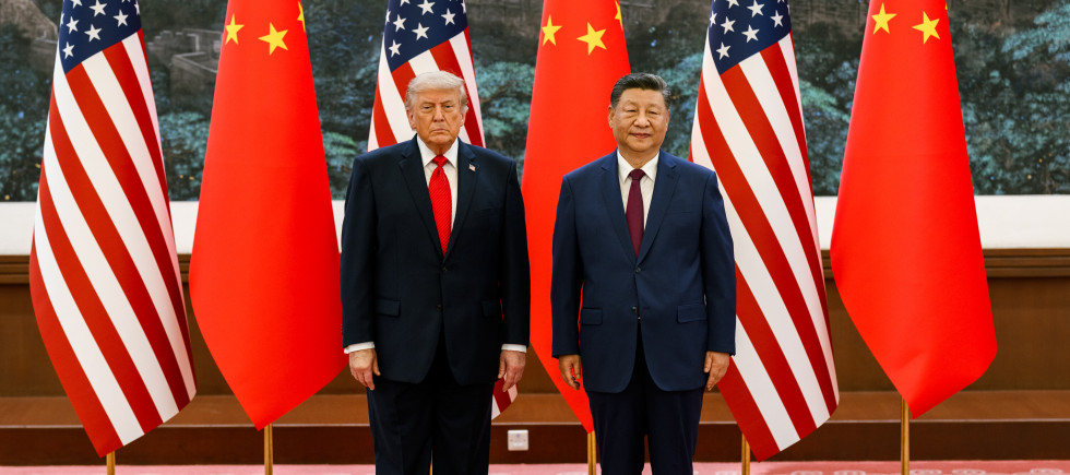 US President Donald Trump participates in a welcoming ceremony with Chinese President Xi Jinping at the Great Hall of the People in Beijing