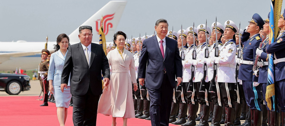In this photo provided by the North Korean government, North Korean leader Kim Jong Un, front left, and his wife Ri Sol Ju, see off Chinese President Xi Jinping, center right, and his wife Peng Liyuan at the airport in Pyongyang, Tuesday, June 9, 2026. 
