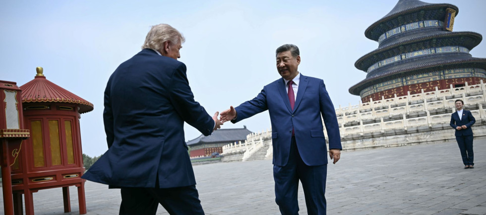 China's President Xi Jinping, right, and U.S. President Donald Trump shake hands at the Temple of Heaven in Beijing Thursday, May 14, 2026.
