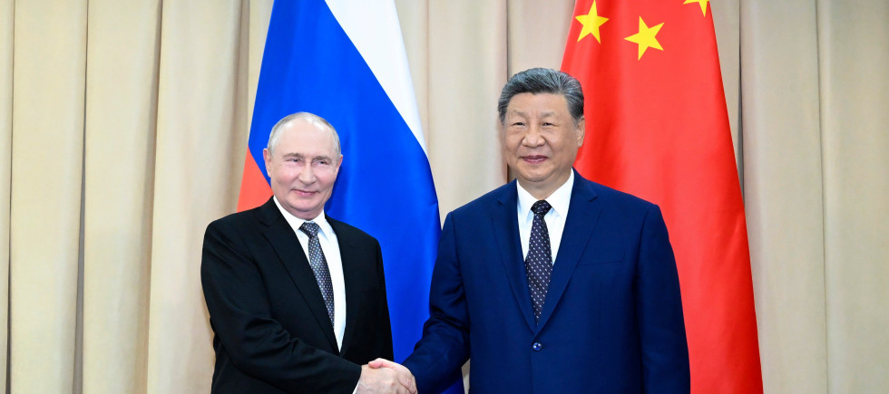 In this photo released by Xinhua News Agency, Chinese President Xi Jinping, right, meets with Russian President Vladimir Putin on the sidelines of the Shanghai Cooperation Organization Summit 2026 in Bishkek, Kyrgyzstan, Monday, Aug. 31, 2026. 