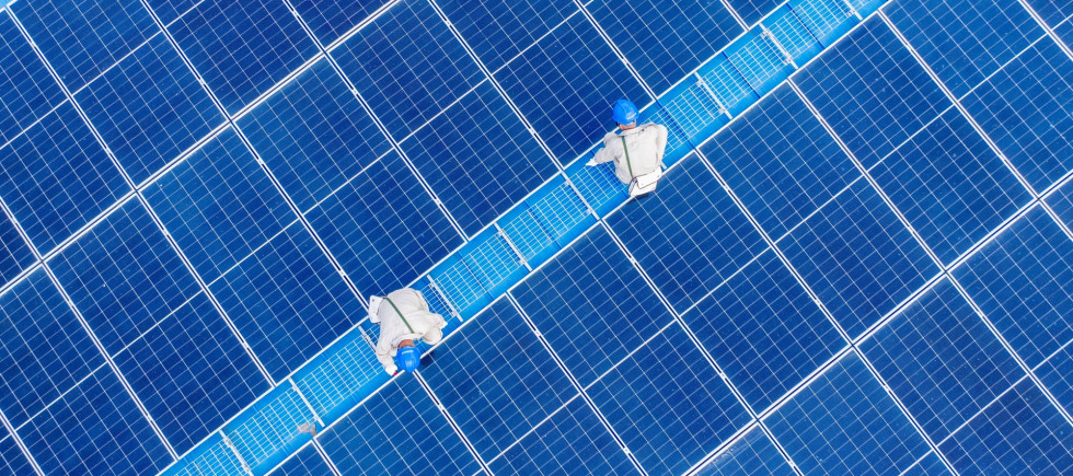 ower workers inspected the operation status of photovoltaic power generation equipment on the roof of a company in Yangzhou City, Jiangsu Province, China on June 24, 2025.