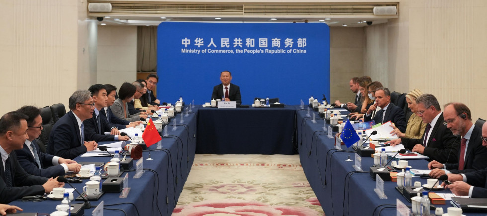 View of Wang Wentao Chinese Minister of Commerce sitting at the head of a large meeting table with Maros Sefcovic European Commissioner for Trade and Economic Security and Interinstitutional Relations on the right side during a meeting at the Ministry of Commerce in Beijing China on 8 October 2026.