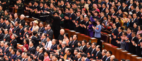 Deputies attend the closing meeting of the National People's Congress in Beijing on March 15, 2019. 