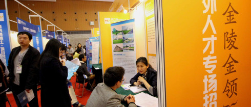 Chinese overseas students at a job fair for returnees in Nanjing, Jiangsu. The government uses monetary and other incentives to woe them to return to China. 