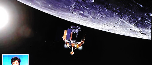 TV screen shot of China's robotic lunar probe Chang'e-4 landing on the far side of the moon on January 3, 2019.