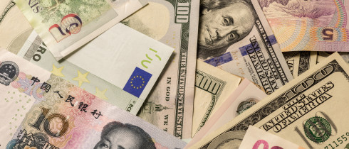 Various currency banknotes including the US-Dollar, Euro and Chinese yuan