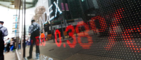Monitor showing stock indices