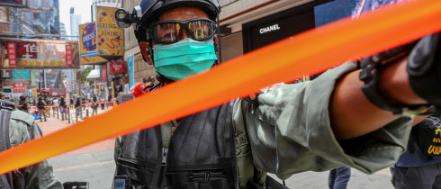 Policy Cordon off area with orange tape in Hong Kong