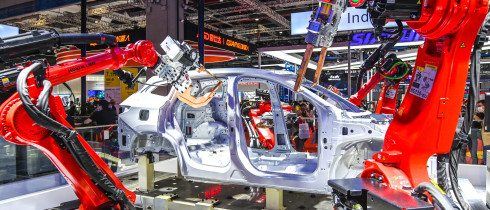  welding robot operates on a vehicle at the stand of Jiangsu Hagong Intelligent Robot Co., Ltd. (HGZN), a high-tech listed company with high-end intelligent manufacturing and industrial robots, during 2020 China International Industry Fair 