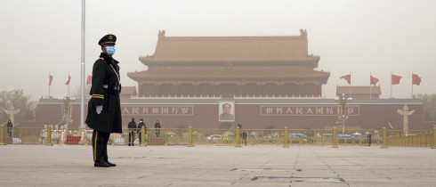Police officers are seen at Tiananmen Square in Beijing