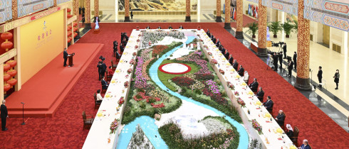 Chinese President Xi Jinping seen on podium and his wife Peng Liyuan host a banquet to welcome guests from around the world.