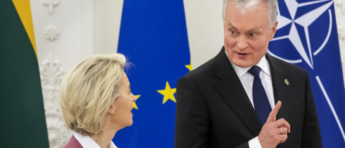 Lithuania's President Gitanas Nauseda, right, and European Commission President Ursula von der Leyen speak prior to their meeting at the Presidential palace in Vilnius, Lithuania, Sunday, Nov. 28, 2021