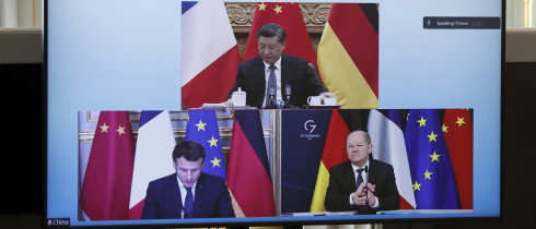 French President Emmanuel Macron, German Chancellor Olaf Scholz, below right, and Chinese President Xi Jinping, top, discussing the Ukraine crisis during a video-conference