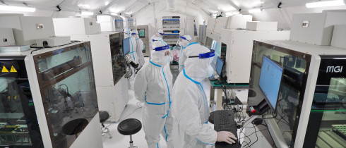 Staff members install and debug equipment at the Huo-Yan laboratory in Yantai, East China's Shandong Province