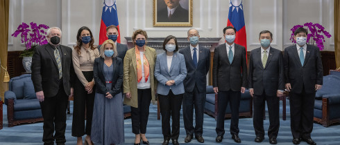 In this photo released by the Taiwan Presidential Office, Taiwan's President Tsai Ing-wen, center right, pose for photos with European Parliament Vice President Nicola Beer, center left, and her delegation at the Presidential Office in Taipei, Taiwan on Wednesday, July 20, 2022.