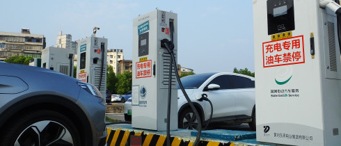A new energy electric vehicle charging pile is seen in Yichang, Hubei province, China, July 31, 2022.