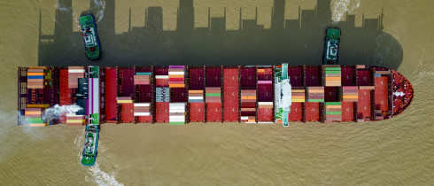 An aerial photo shows a container ship loaded with containers leaving the wharf at Yangshan Deep Water Port Area of Shanghai Port in Shanghai, China, Sept 11, 2022.