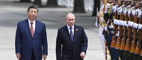 Chinese President Xi Jinping, left, and Russian President Vladimir Putin review the honor guard during an official welcome ceremony in Beijing, China, Thursday, May 16, 2024.