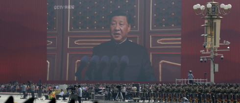 A huge screen shows Chinese President Xi Jinping delivering a speech at the start of a parade to mark the 70th anniversary of the founding of the People's Republic of China, in Beijing, Tuesday, Oct. 1, 2019. (AP Photo/Mark Schiefelbein)